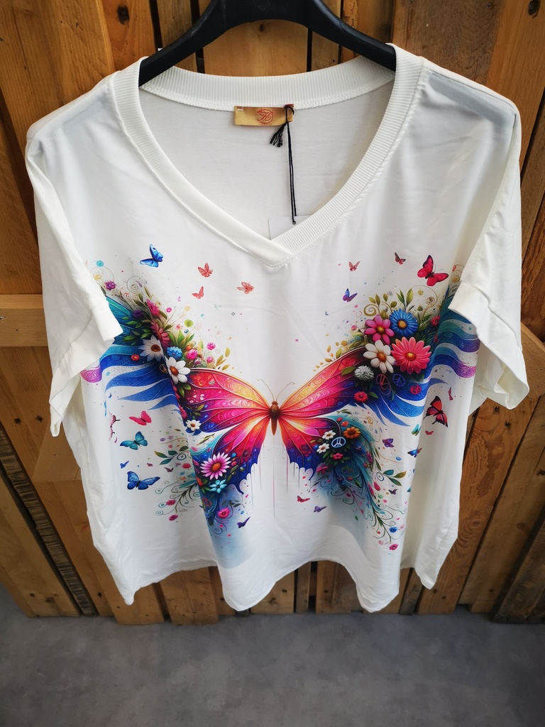 Blouse papillons et fleurs sur fond blanc