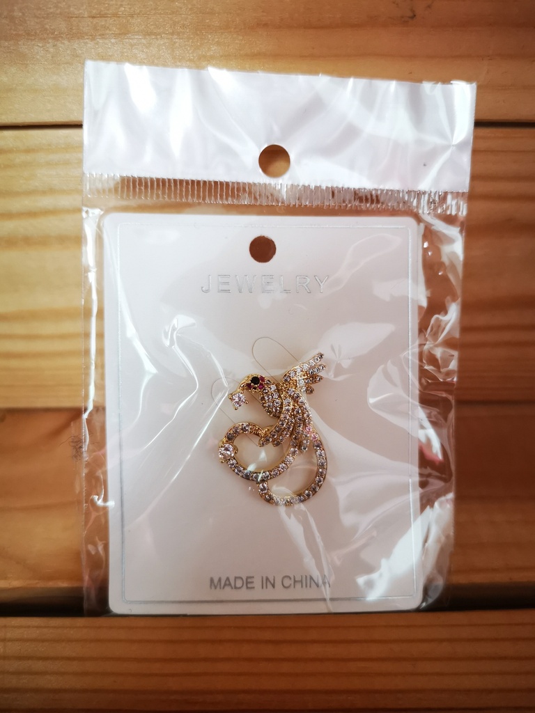 Pin's colibri doré avec strass