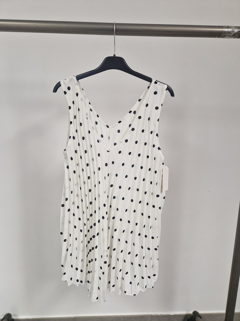 Top plissé blanc à petits pois