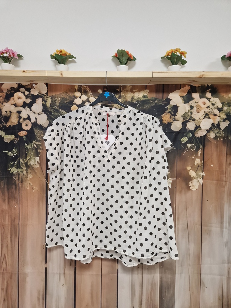 Blouse blanche à pois noir