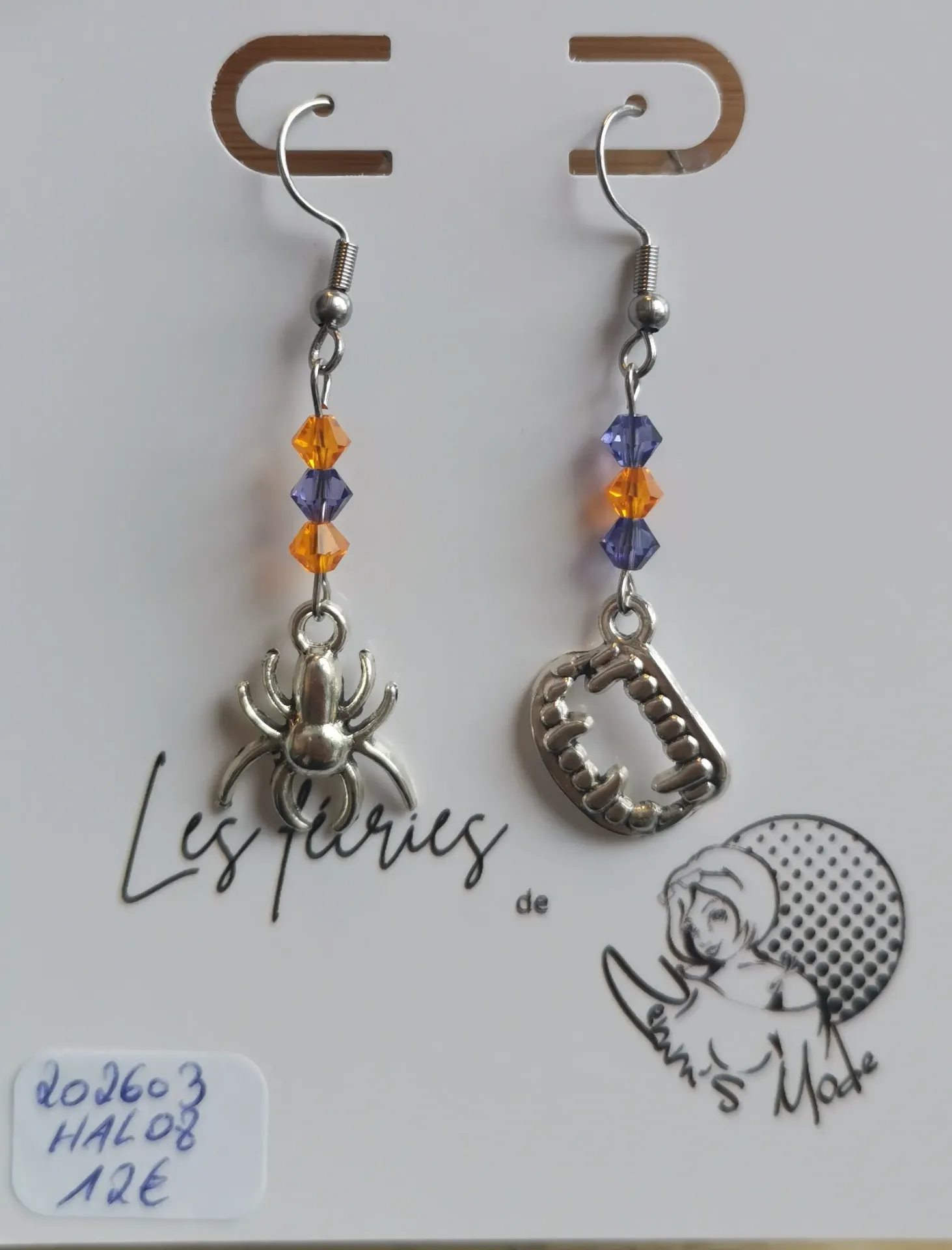 Boucles d'oreilles argentées dents/araignée toupies Orange Fluo & Iris