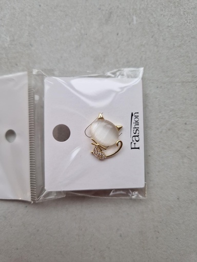 Pin's chat nacré doré